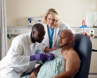 Person getting chemotherapy through a port-a-cath